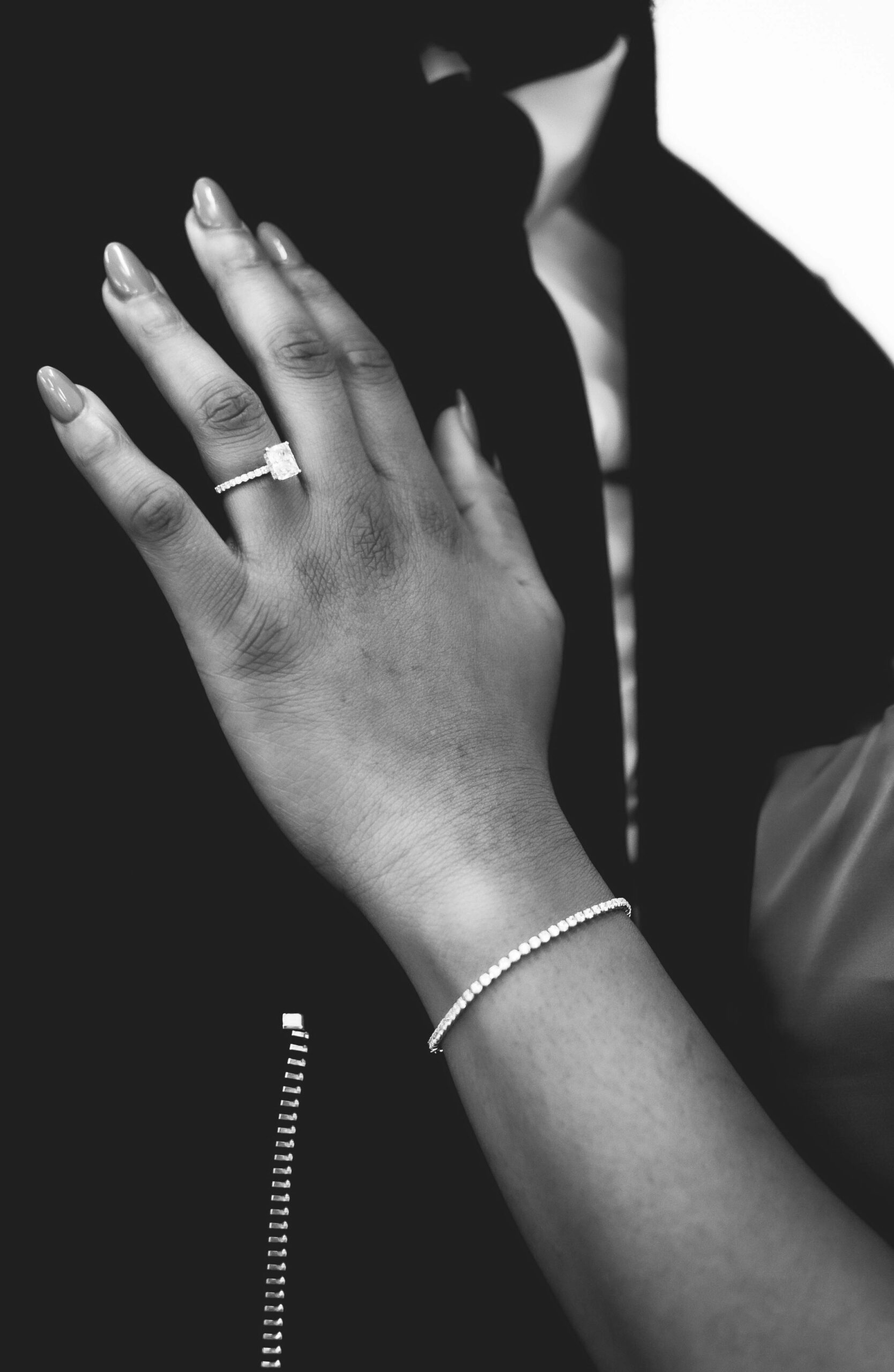 Diamond engagement ring and tennis bracelet by Jay Gems