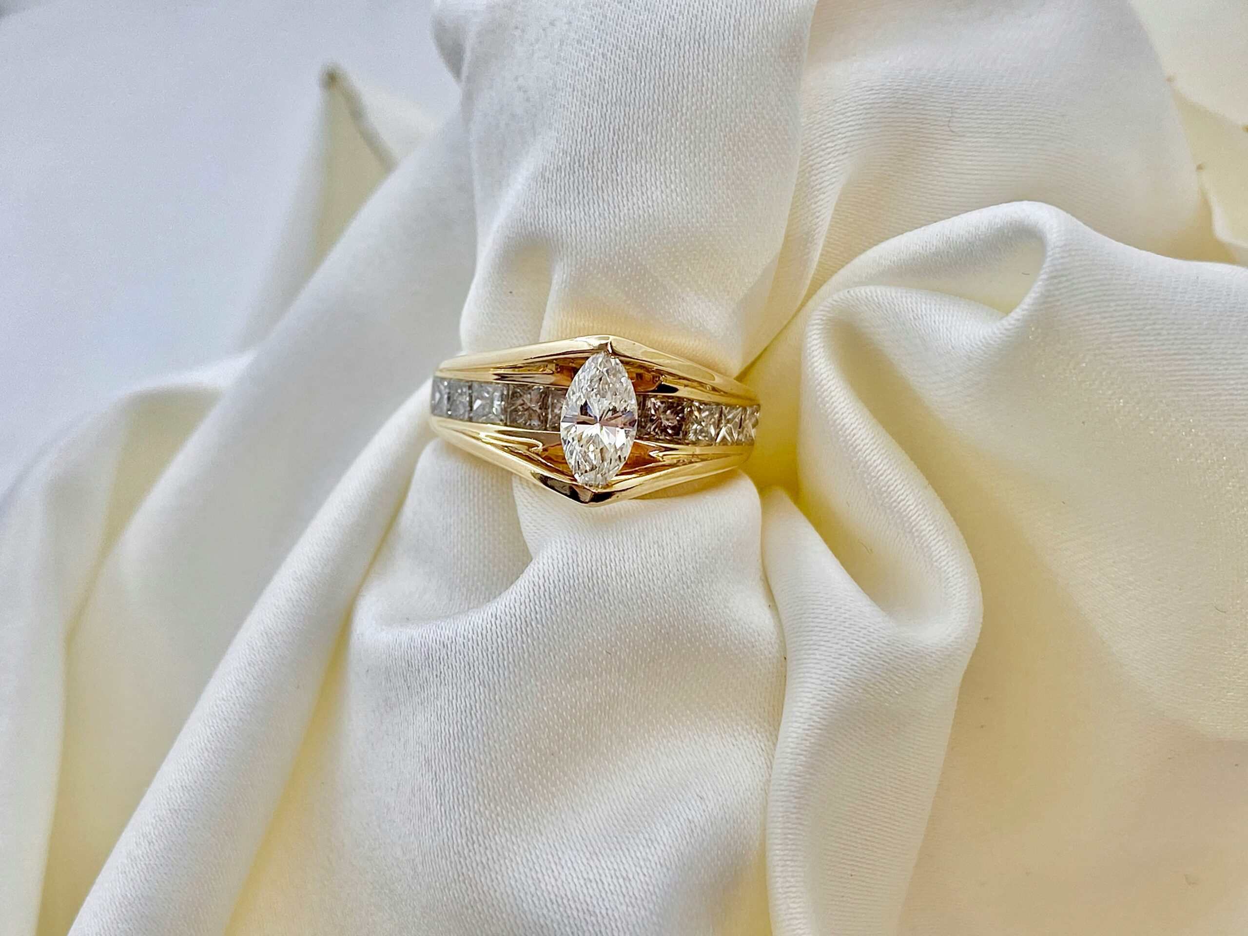Pear shaped halo diamond ring with tennis bracelet by Jay Gems