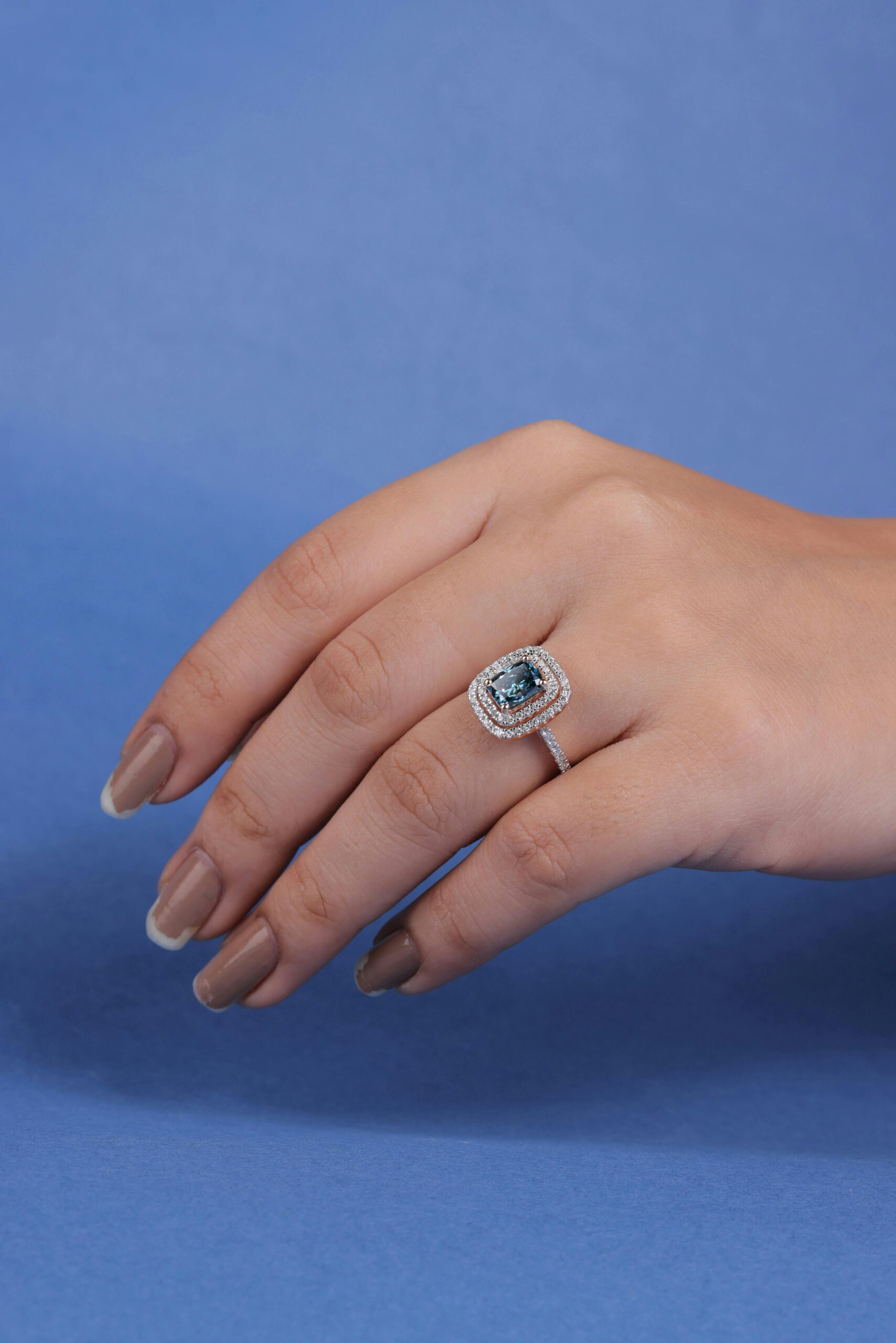 Custom blue gemstone double halo diamond ring by Jay Gems Bangkok